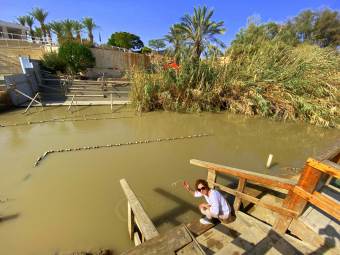 River Jordan at Bethany Bejond the Jordan with Israel on the other side